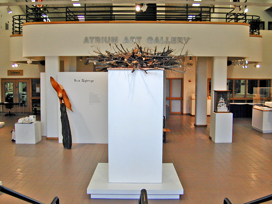 Atrium Art Gallery Exhibition with eagle nest in foreground