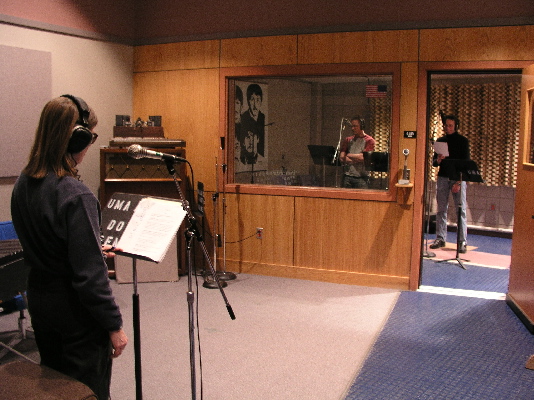 Dianne in the studio with students rehearsing and recording the script